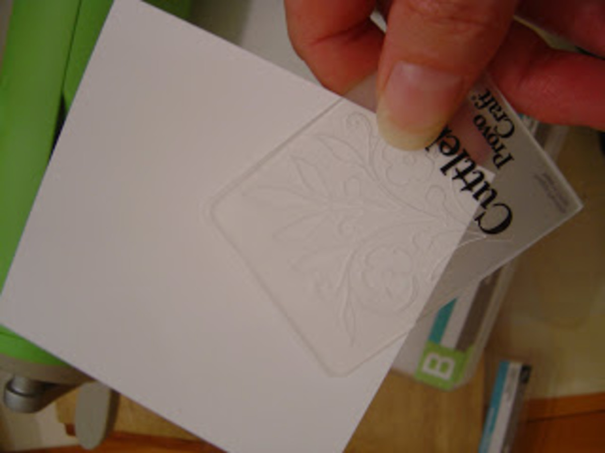 Placing a small embossing folder in the corners of your card stock creates an interesting design