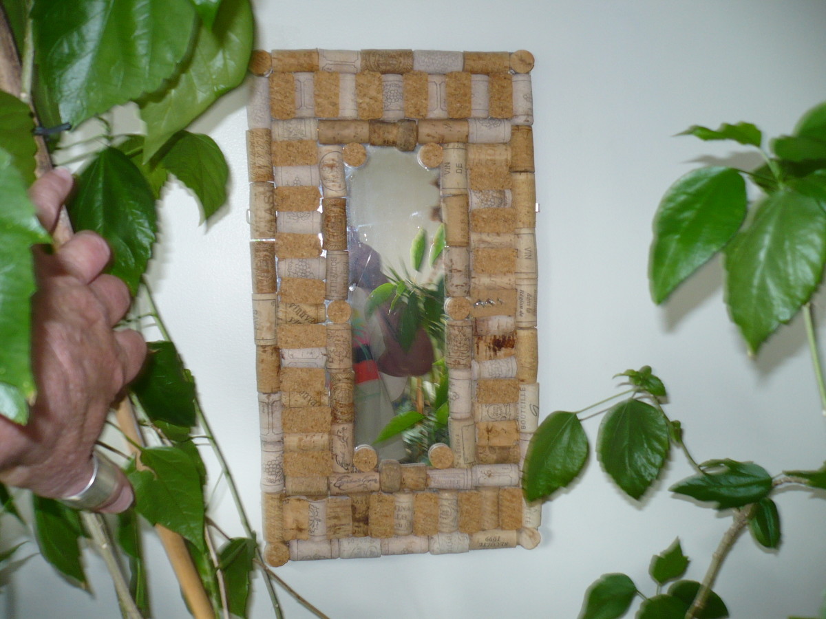 Frame a Mirror with wine bottle corks.