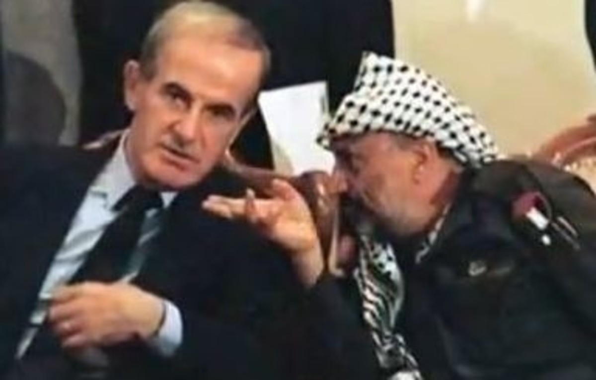 Syrian Hafez al-Assad with Yasser Arafat