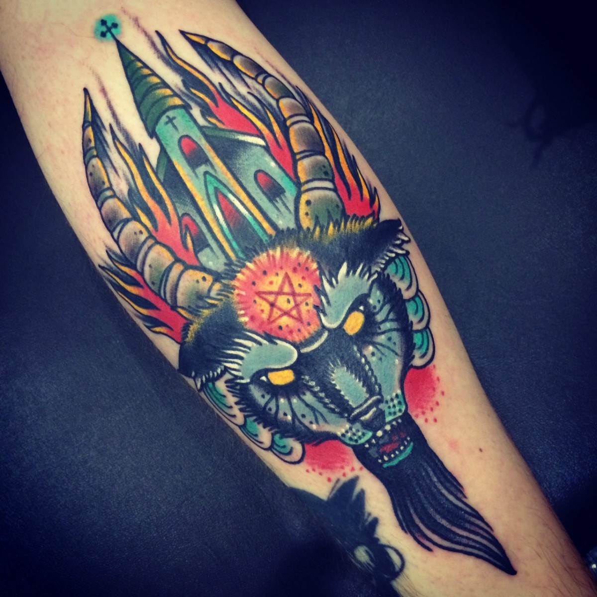 Goat head with a burning church between the horns. Miguel Lepage from Saving Grace Tattoo in Montreal, Quebec. (Done at the Vancouver Tattoo and Culture)