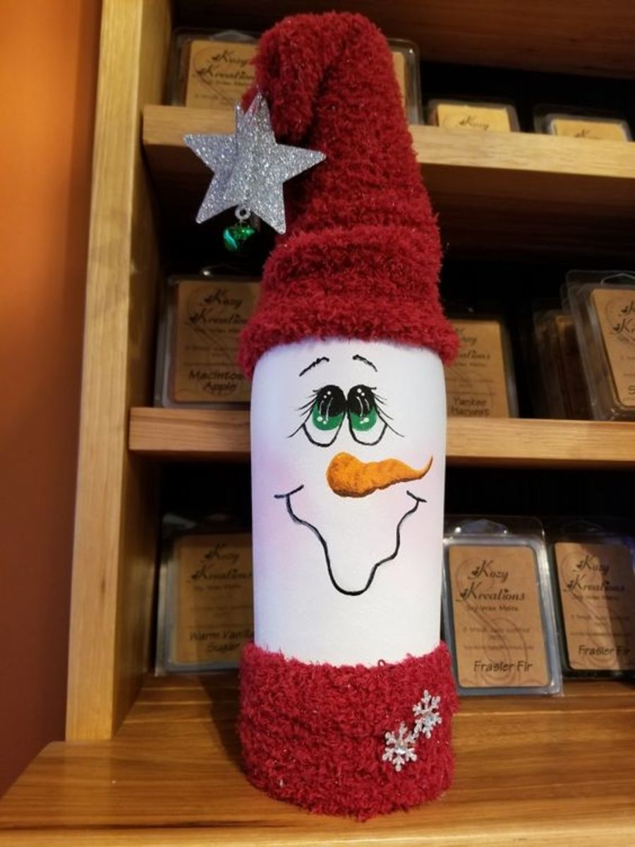 Snowman painted wine bottle