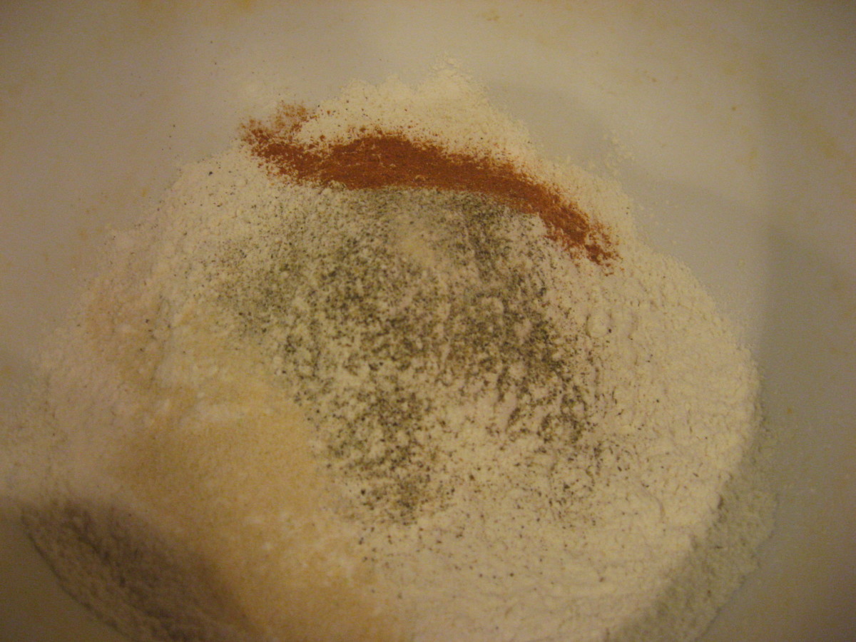 Combine cornmeal, flour, and dry seasonings.