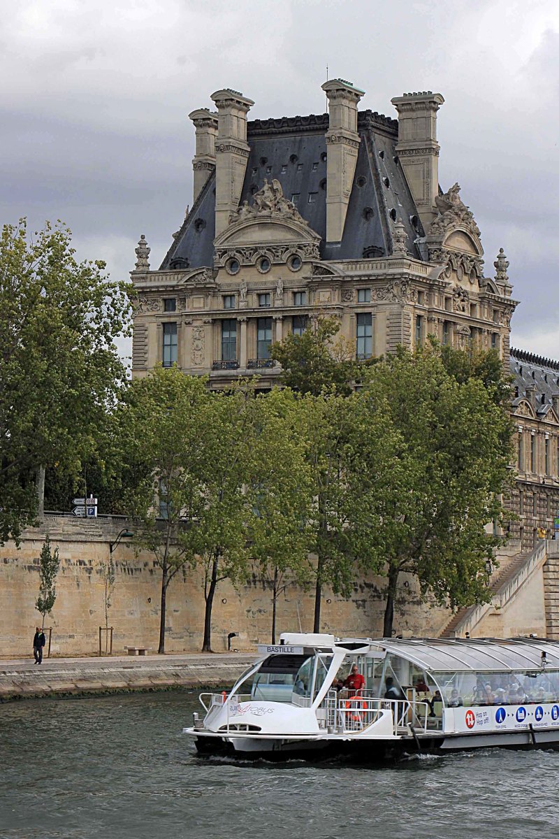 One of the many boats which ferry tourists along the most scenic stretch of the water. The boats offer a relaxed platform from which to photograph the buildings of Paris, and a trip along the river is well worth taking