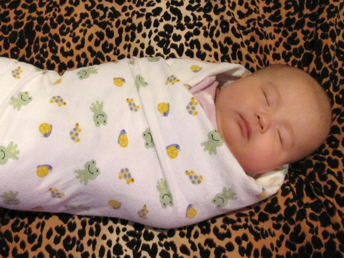 How to Swaddle a Newborn Baby With a Receiving Blanket 