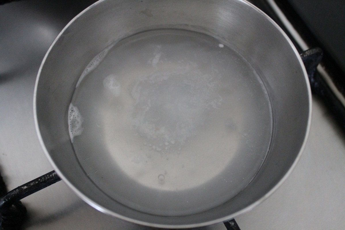 Warm water and detergent solution for cleaning gold
