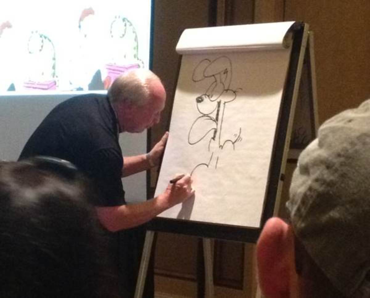 Jim Davis drawing Odie