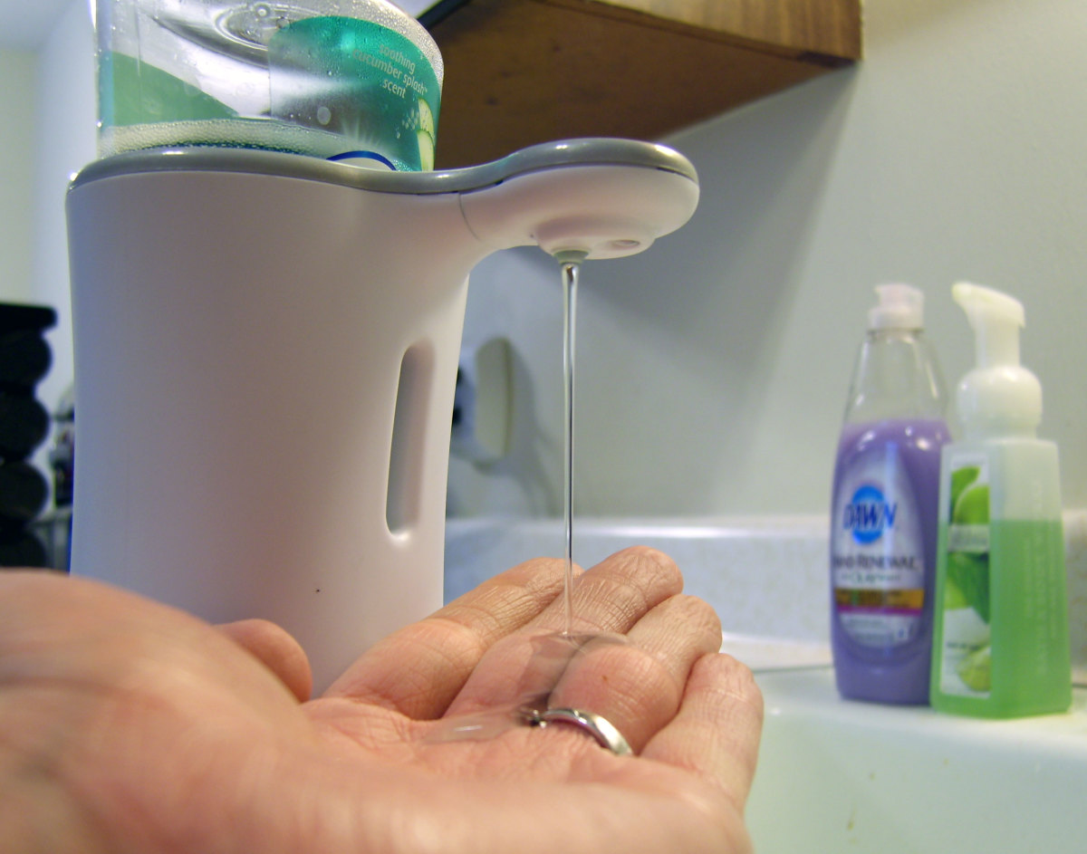 The Lysol No-Touch, shown here dispensing watered-down Lysol Healthy Touch hand soap with the sponge modification. This setup provides what I consider "just the right amount" of soap.