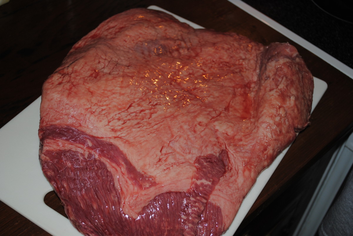 A 7 1/2 lb beef brisket, with the fat cap up, the 'top' side. You can find these in grocery stores sold as "flat" or "round" - or buy them in cryovac packages in wholesale clubs. They cost much less bought in bulk.
