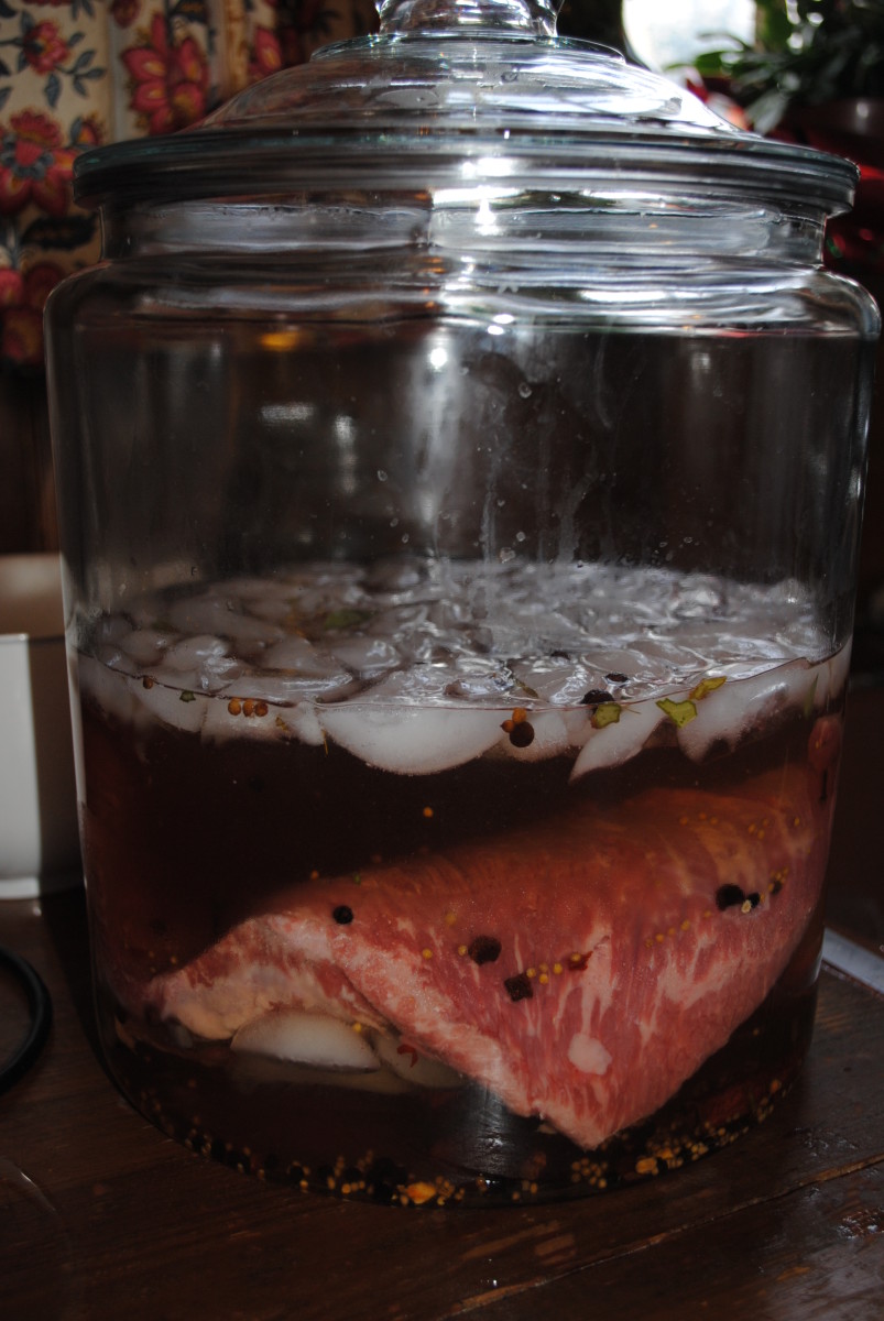 Find a container large enough to hold the entire brisket and brine, with the brisket completely submerged. Make sure it's glass or plastic, or non-reactive metal.