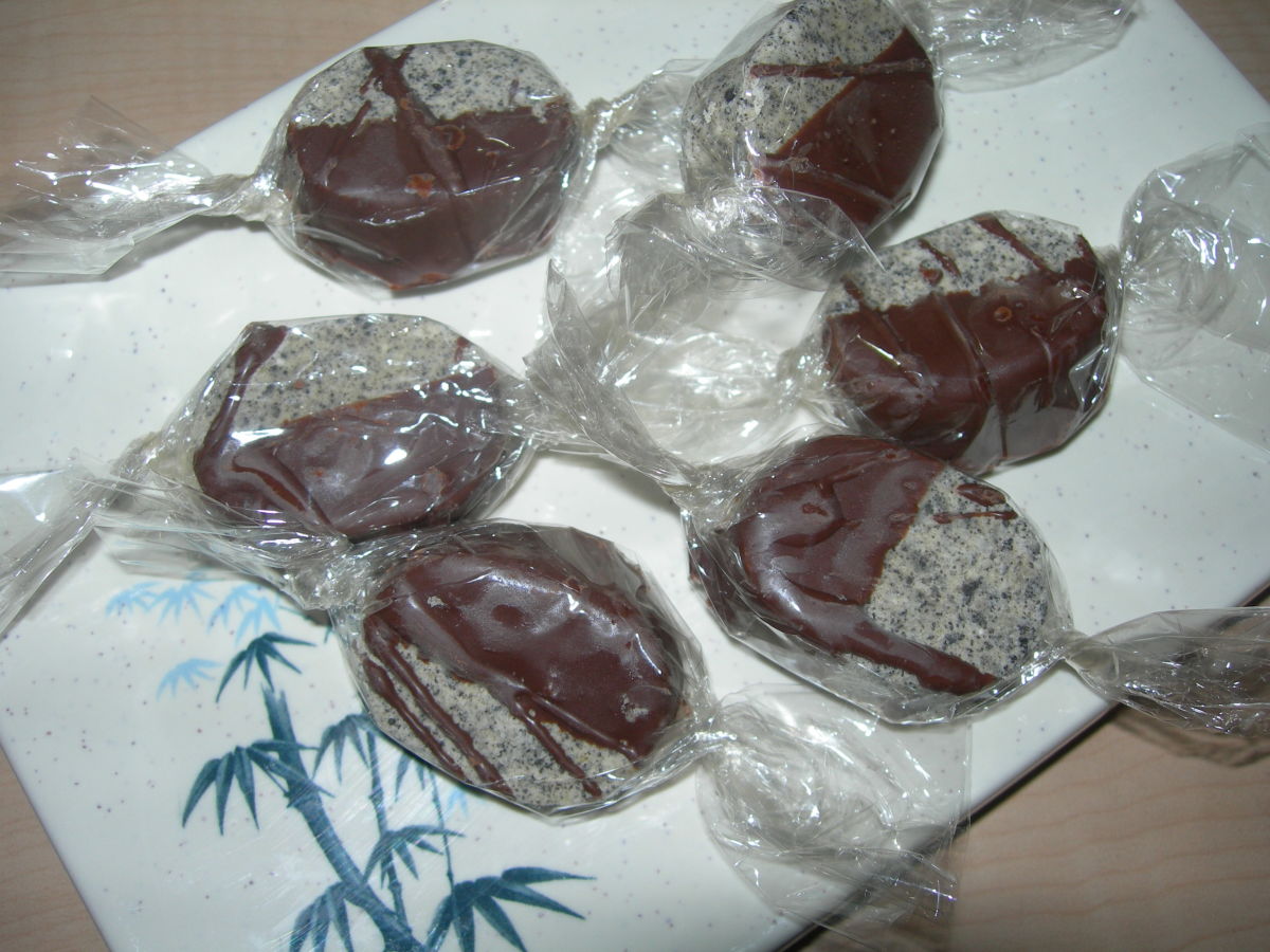 cockies 'n cream polvorons dipped in dark chocolate and wrapped in cellophane