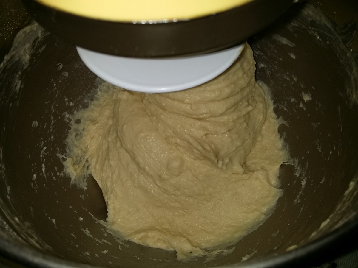 Notice how most of the dough remains at the bottom of the bowl as the kneading begins.