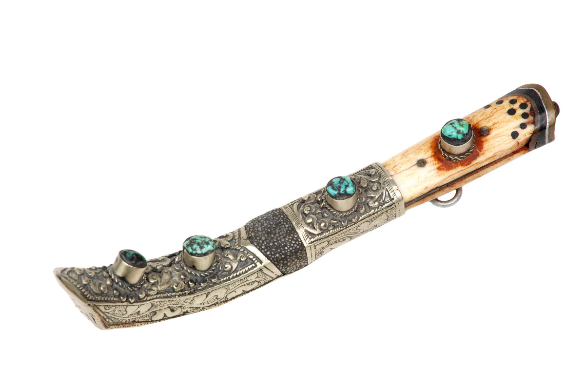 Turquoise has been used for centuries. Here, it adorns a knife.