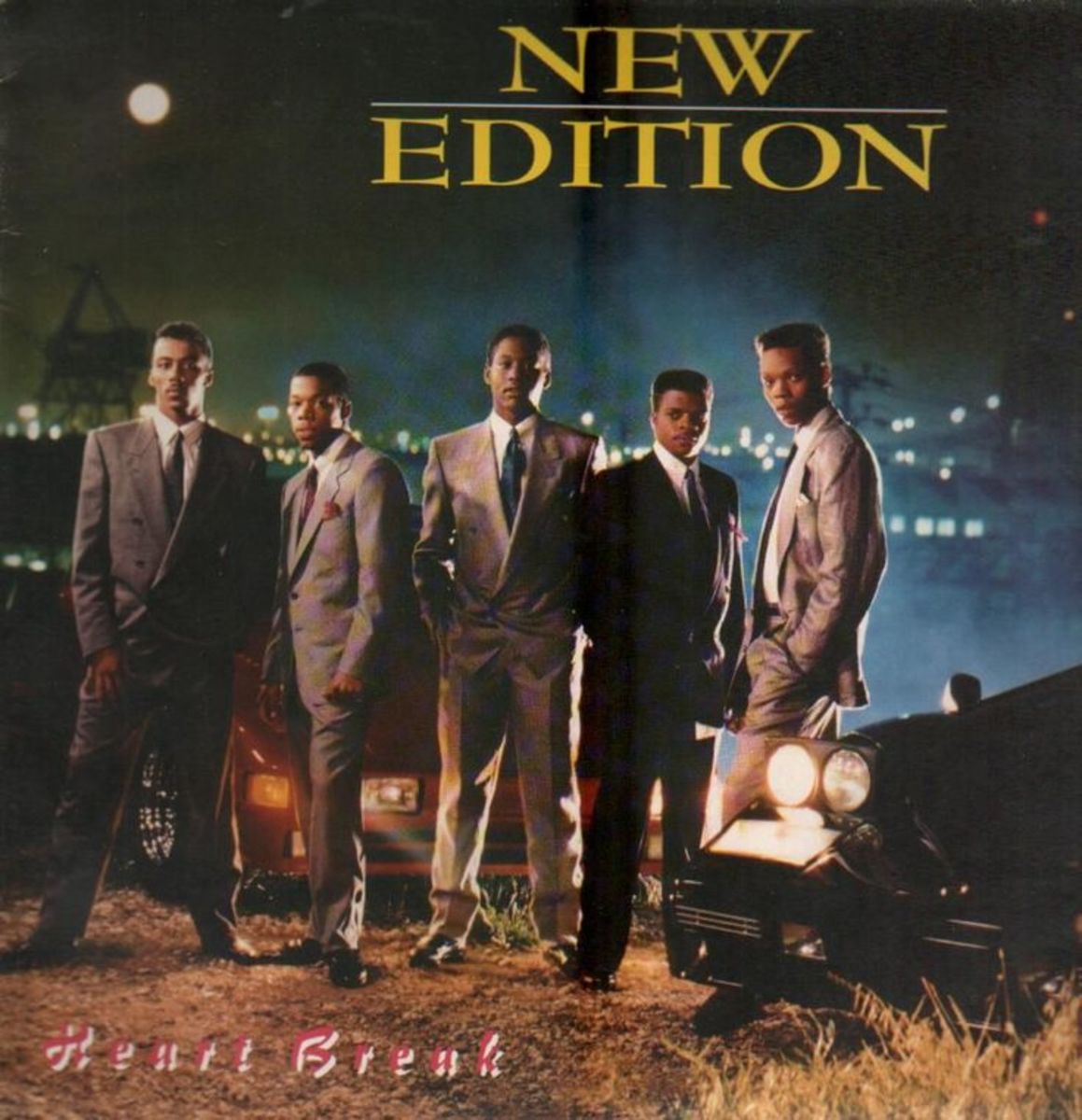 New Edition welcomes new addition, Johnny Gill in this suave night scene.