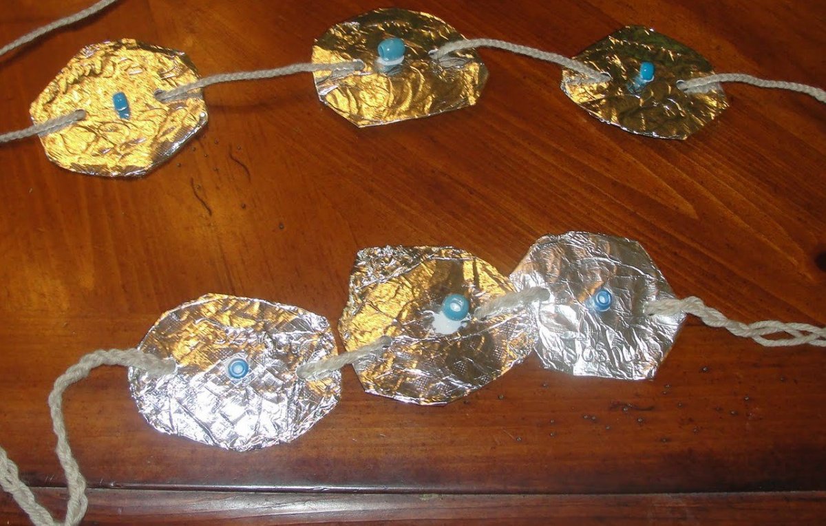 Navajo Cocho-style Belts made using yarn, aluminum foil, and pony craft beads