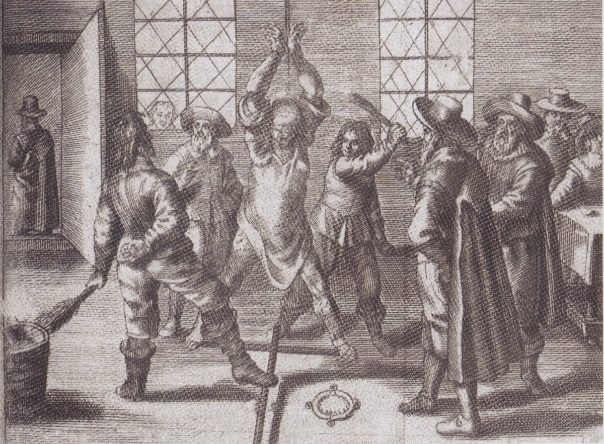 一幅德国的女巫审判蚀刻画:在被指控的女巫身下的地板上可以看到一个女巫的衣领。
