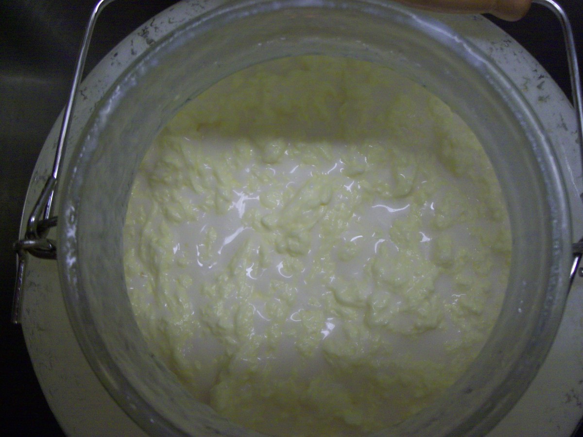 You are finished churning when the butter is gathered in a big clump.