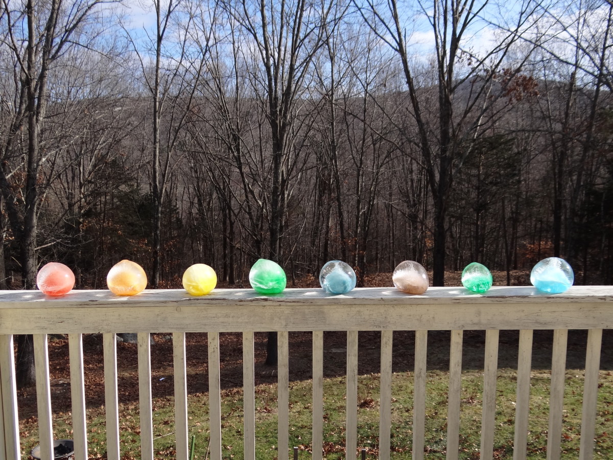 A row of colorful sparkling ice gems brighten up the barren winter landscape.