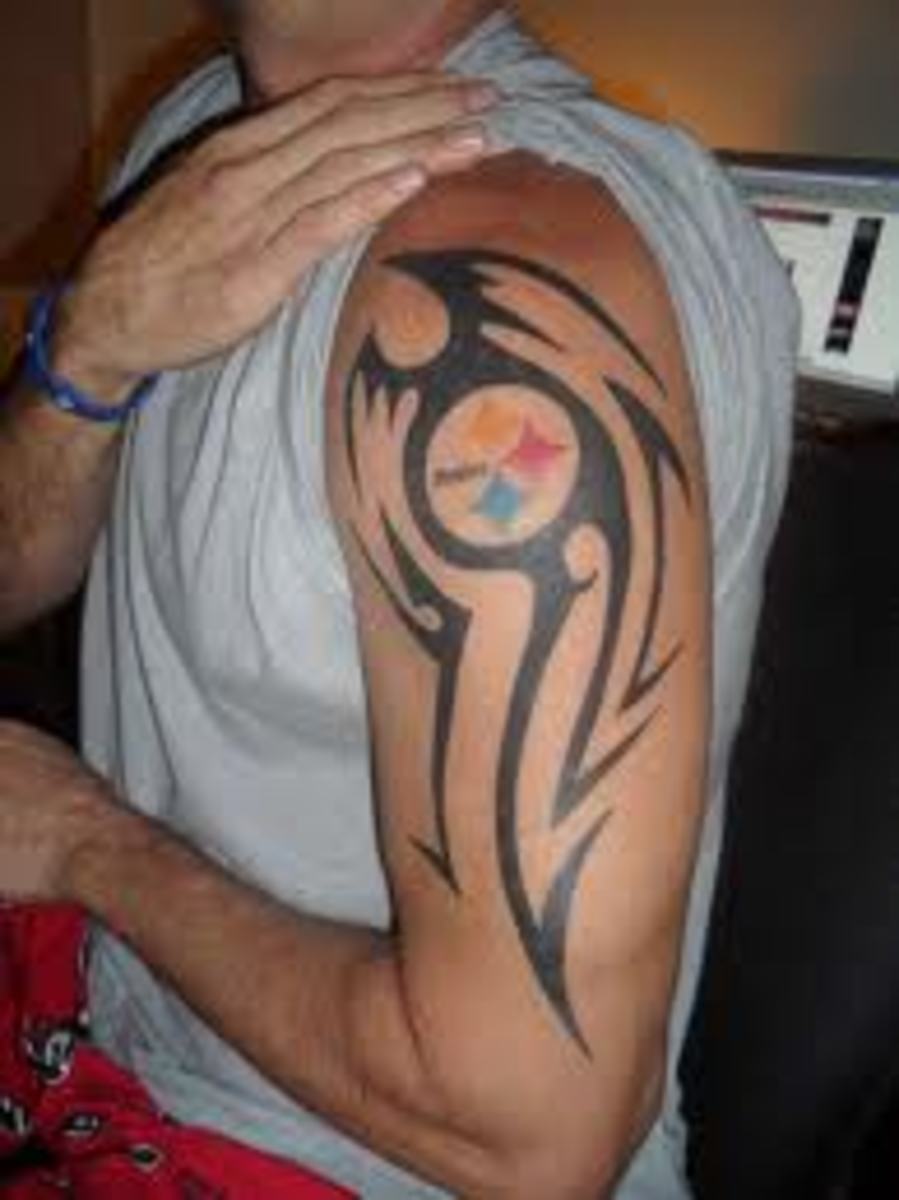 Pittsburgh Steelers Helmet With Wording Tattoo On Mens Forearm