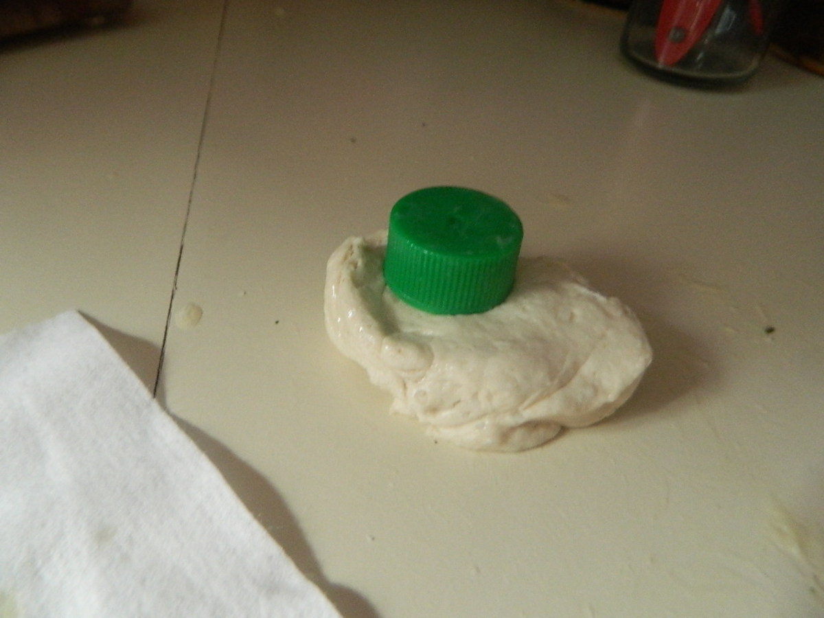 Use a bottle cap to form mini biscuits