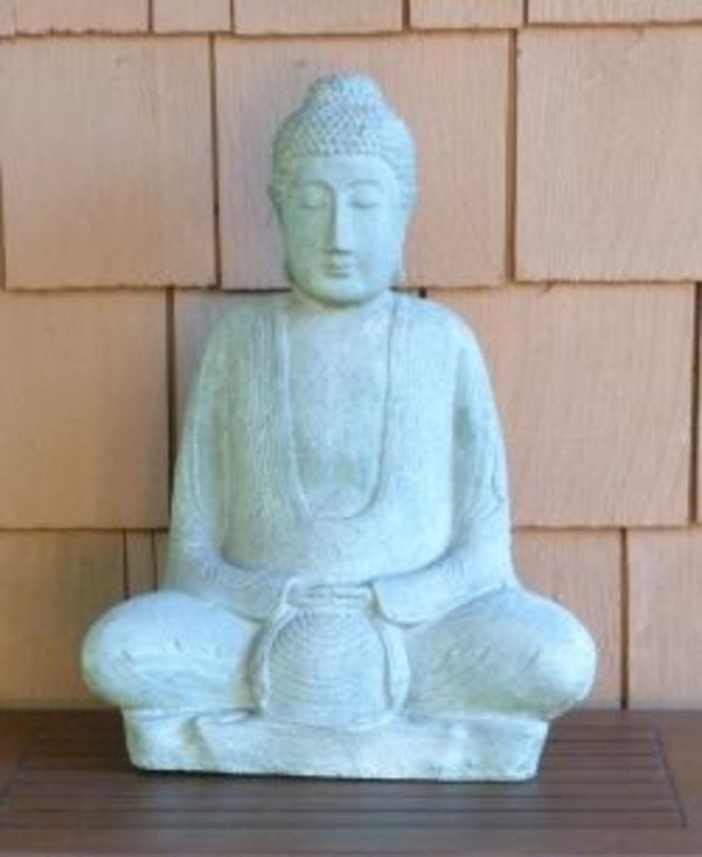 A buddha portraying the Dhyana (or Yoga) Mudra hand gesture.