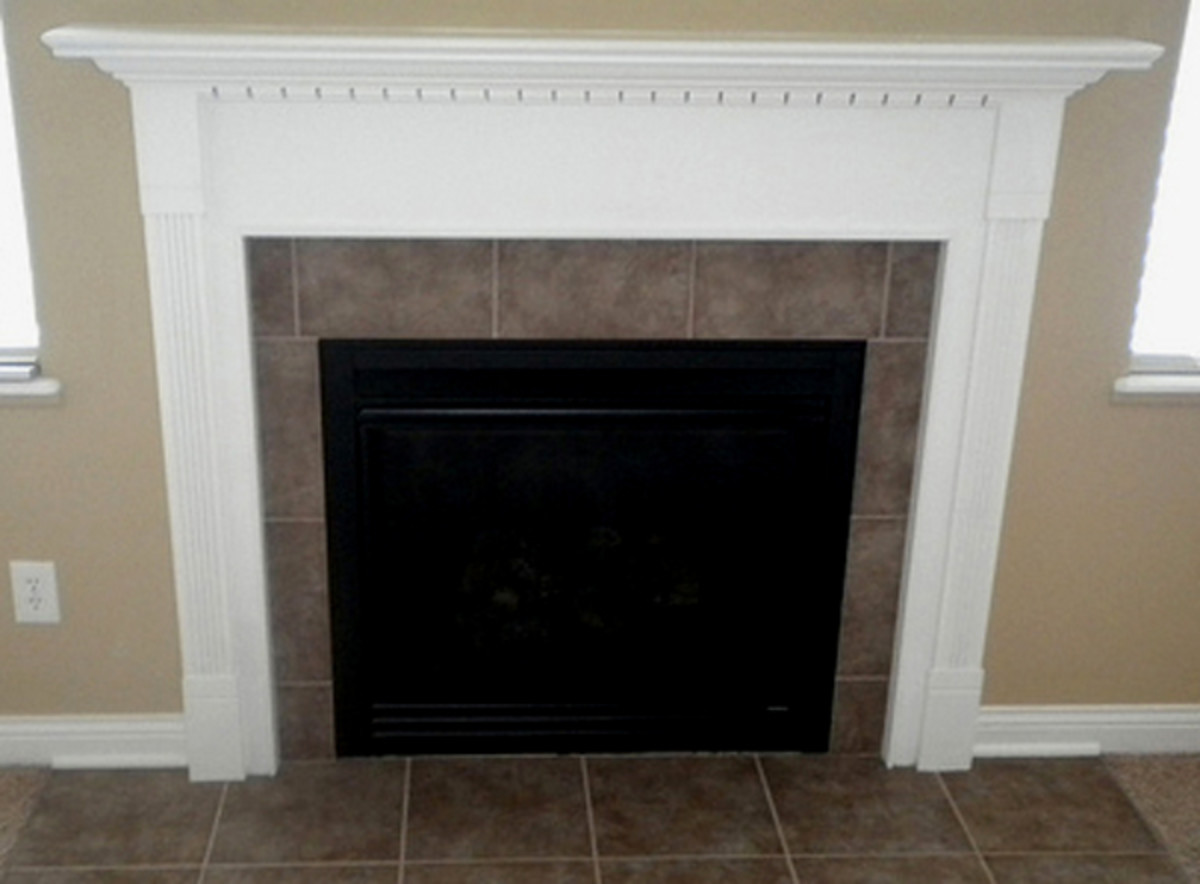 This fireplace could use a thicker mantel and wider pilasters.