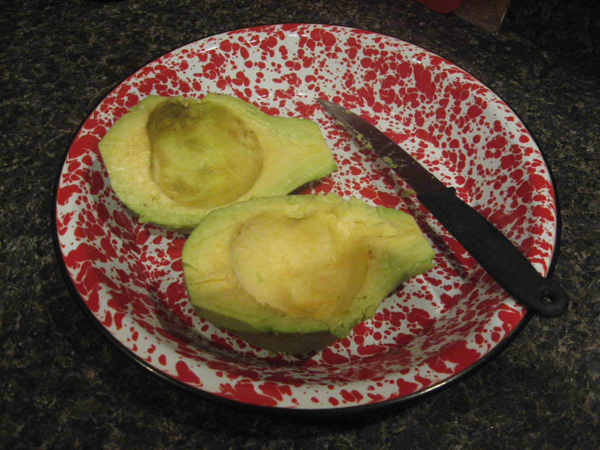 Peel and halve the avocado.