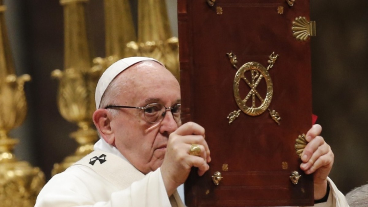 Pope Francis flashing the Chi-rho sign.