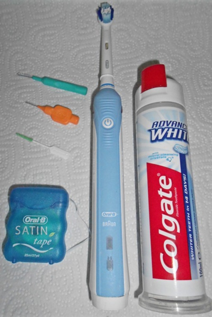 This is my own 'arsenal' to protect myself from gum disease comprising dental tape, rubber interdental brush, two different sizes of the bottle brush type of interdental brush, my electric toothbrush and toothpaste