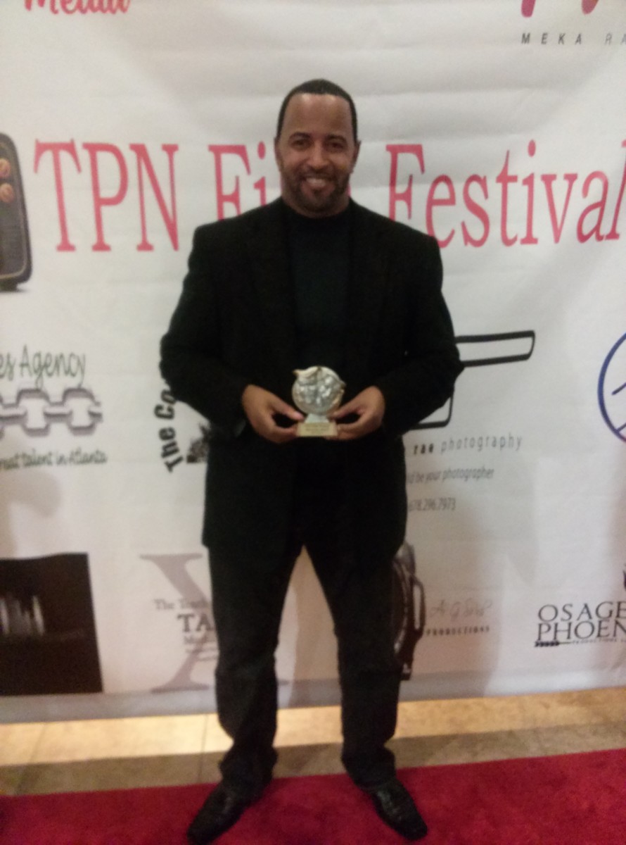Troy won The Best Actor Award in 2014 for The People's Network dramatic presentation of, "The Author"