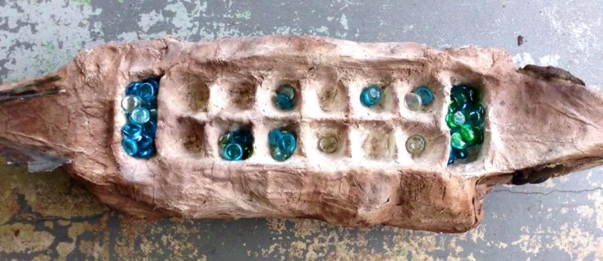 The Crocodile Mancala game board created by my Sculpture students.