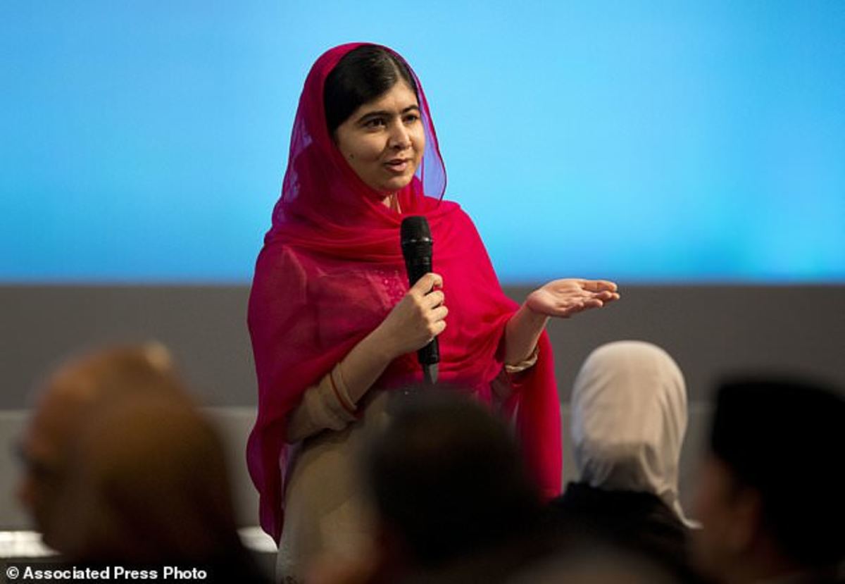 Malala Yousafzai speaking to people after returning to Pakistan