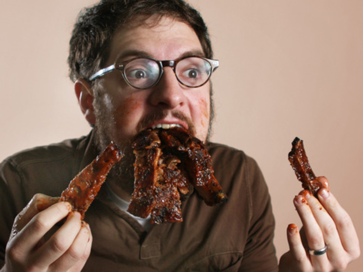 Devouring, not eating, is how most males eat their ribs.
