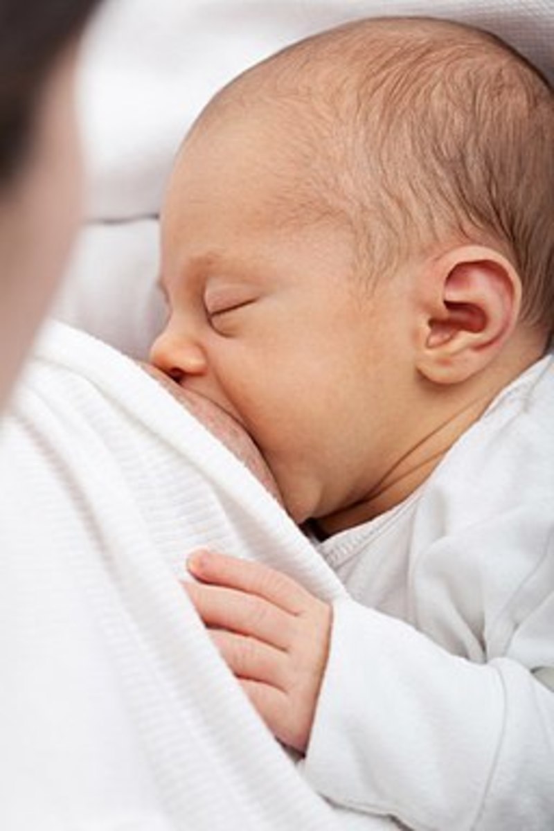 A newborn breastfeeding 