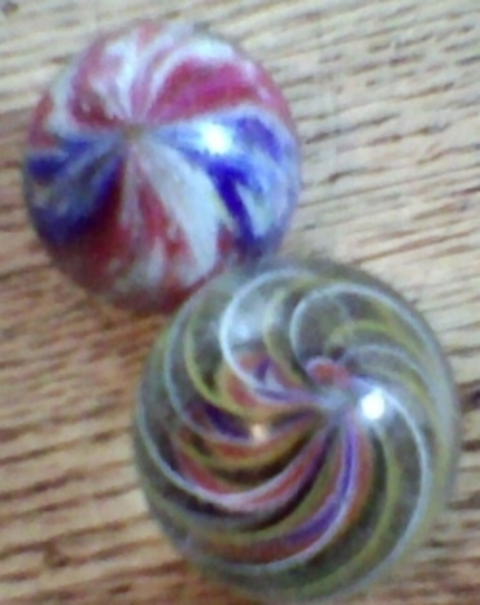 Onionskin on top and solid core swirl on bottom. Handmades.