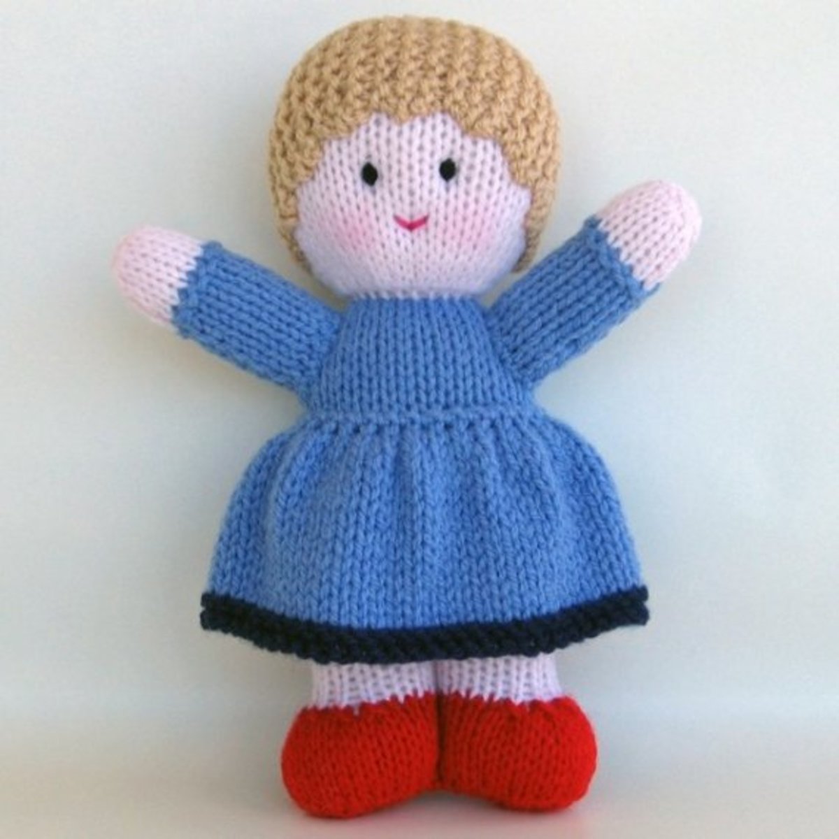 Bluebell, a knitted doll