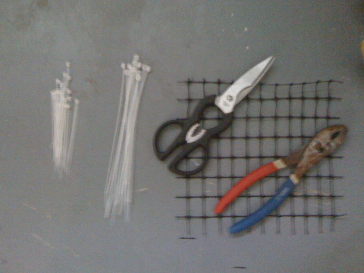 Mesh, scissors, pliers, and assorted zip ties