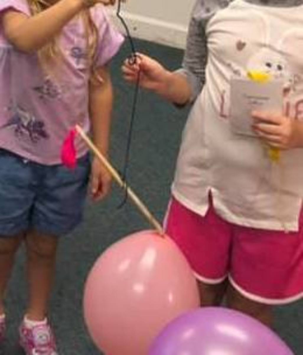 Using balloons to show how air has weight