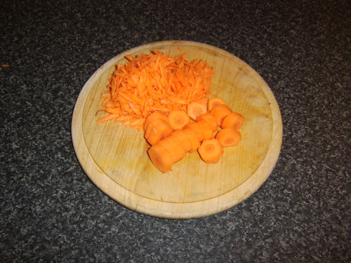One carrot should be grated and the other sliced in to discs