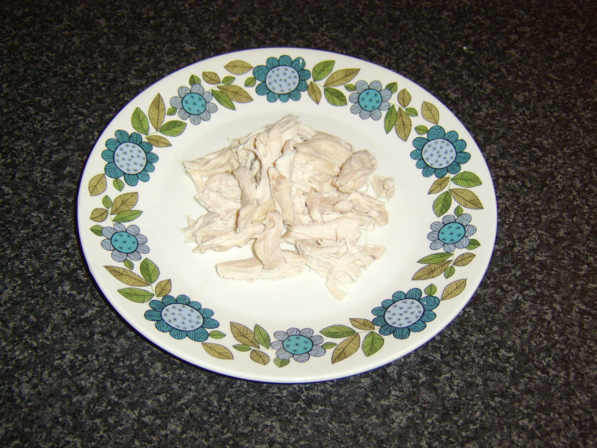 The chicken meat is pulled from the bones rather than cut for a rustic effect