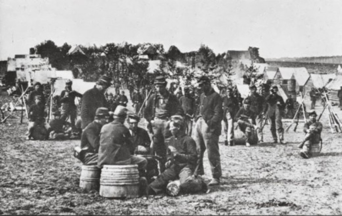 A posed photograph of troops as they play cards
