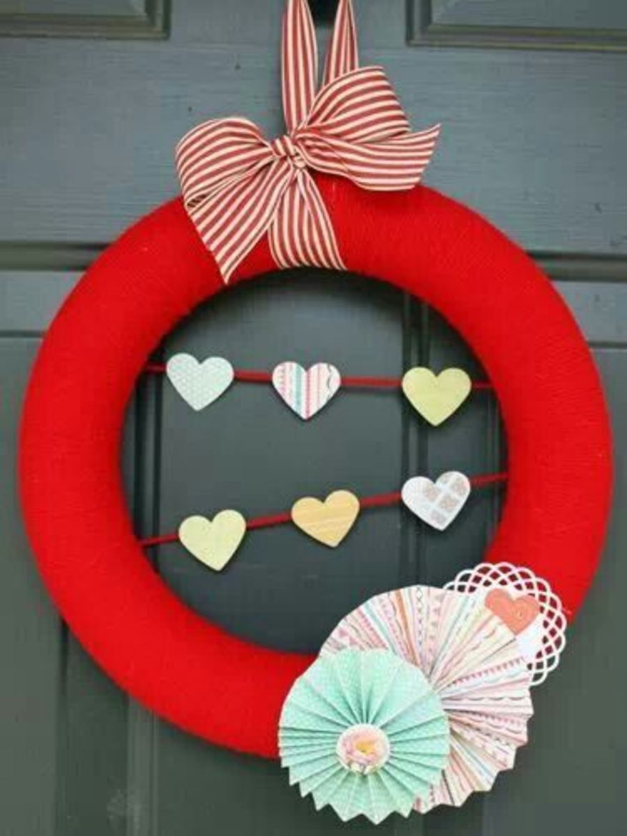 You can find out how to make this great looking Valentine's Day wreath at meandmyscraps.blogspot.com   It's a quick and easy craft project for you.
