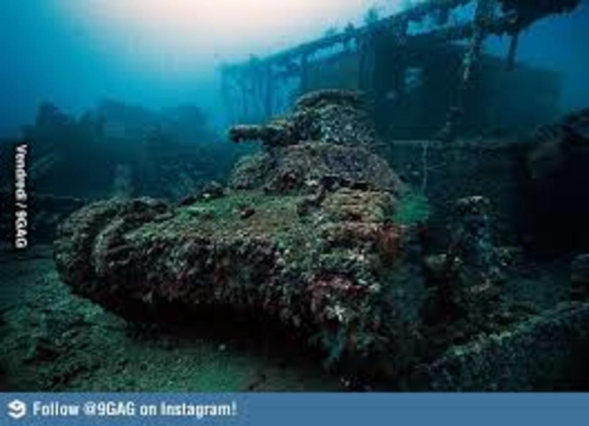 military-warship-tank-airplane-graveyard-under-the-sea-sunken-wwii-hardware