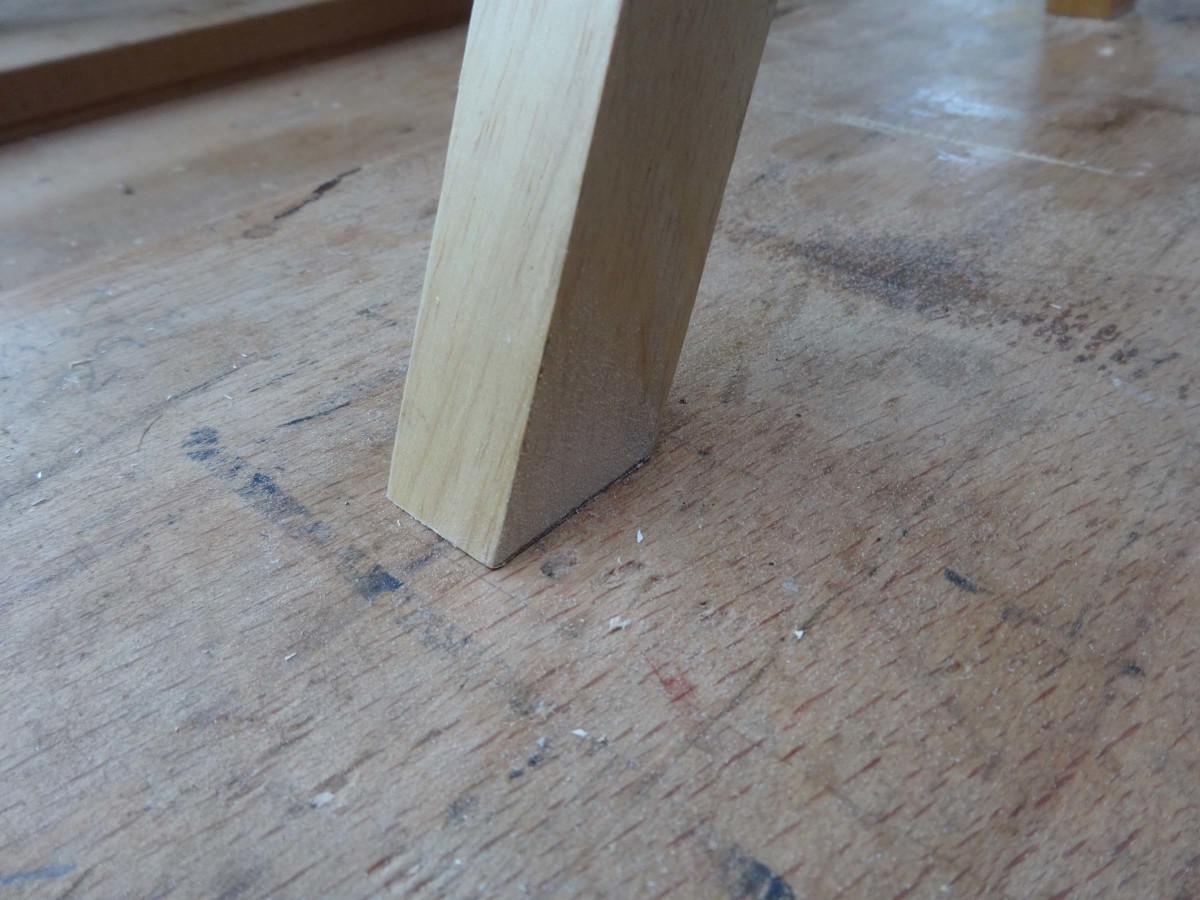Testing stability of table after making feet flat