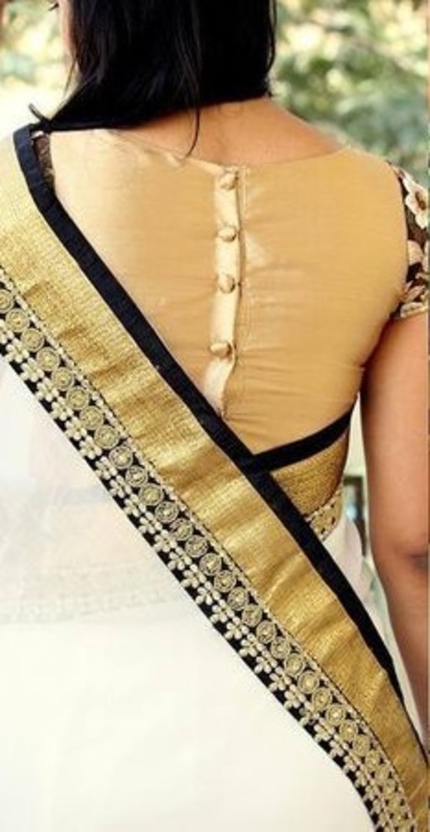 golden blouse for white saree with fabric covered buttons at the back