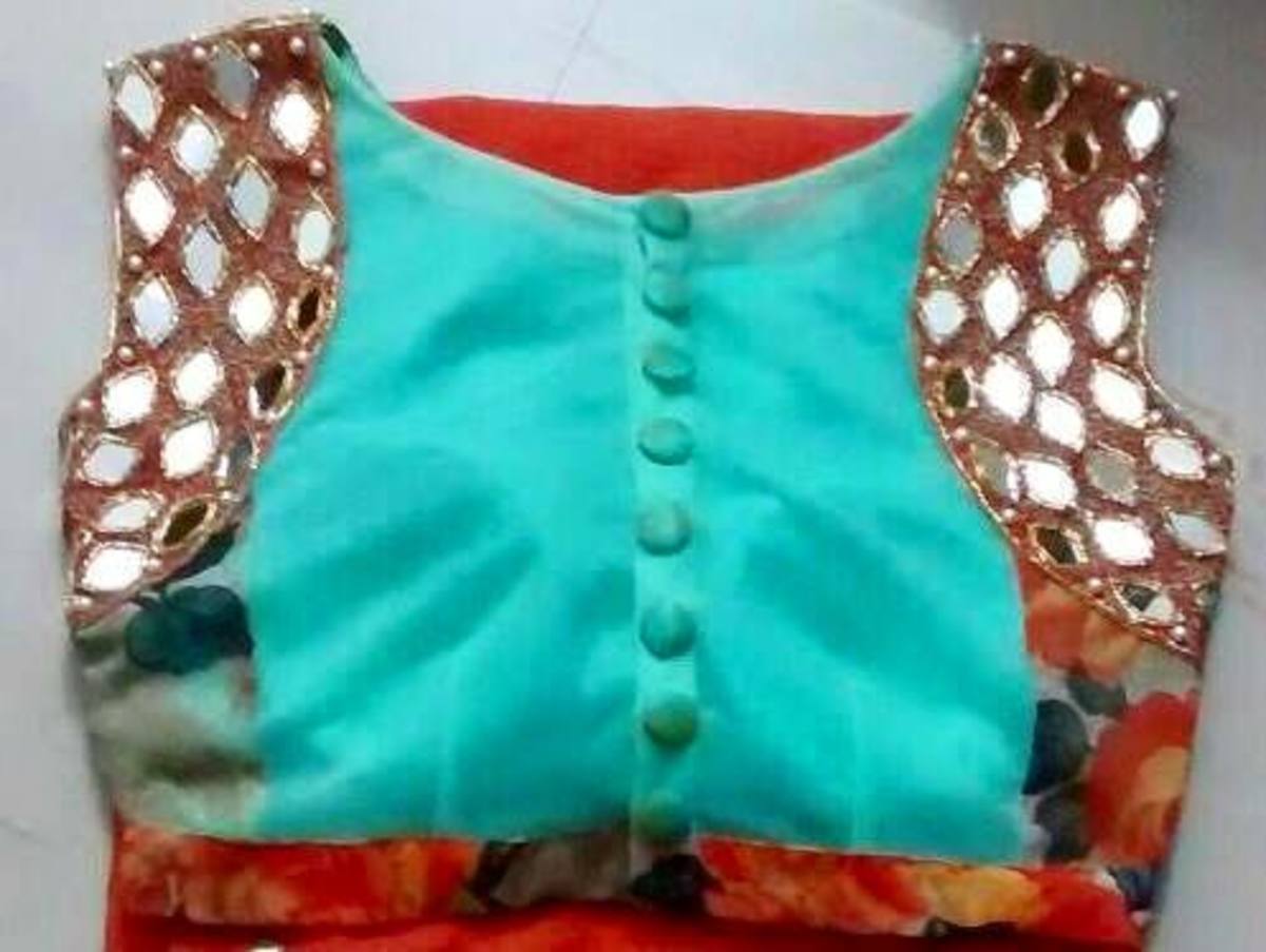 Back side of blouse with buttons which makes it look very classy 