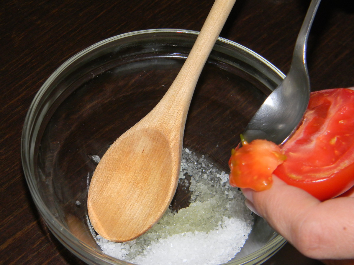 Scoop the inside of your halved tomato into the Sea Salt and oil mix