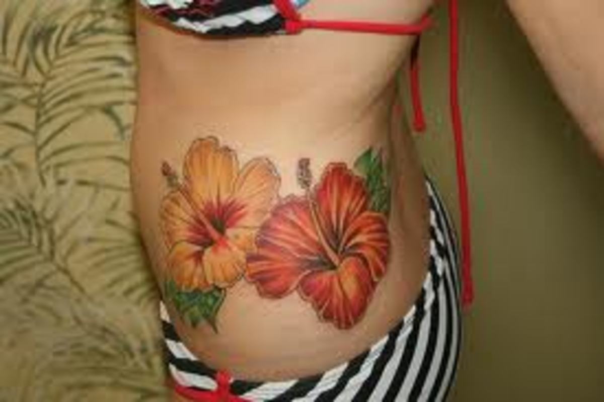 Hibiscus tattoo design that contains two hibiscus flowers.