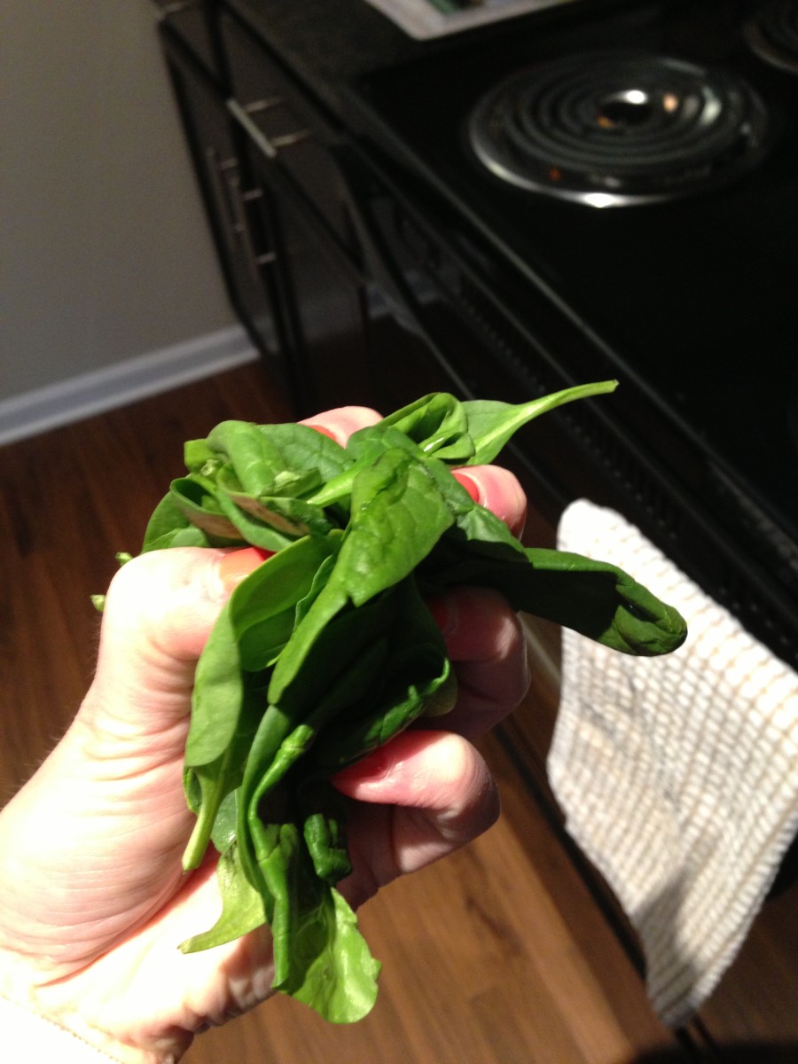 Step 2: Gather a small handful of spinach