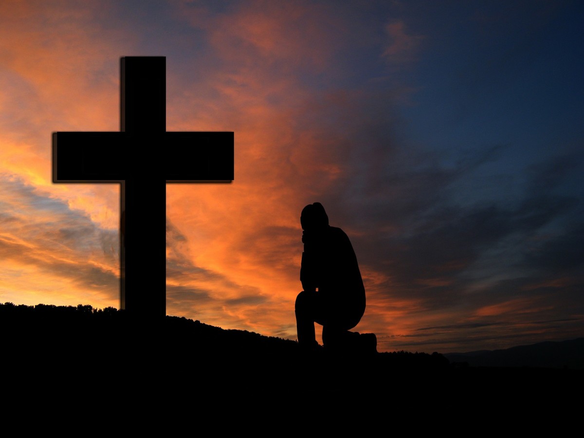 Kneeling at the cross