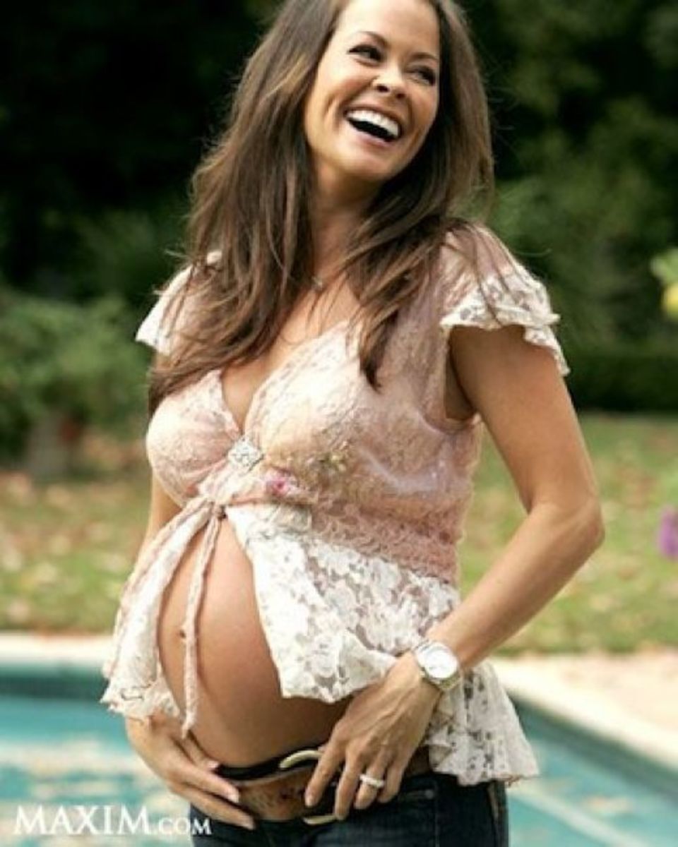 Brooke Burke -- even if you can carry this attire it is not fashionable for ordinary pregnant to wear what do ya think?